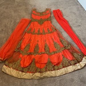 Orange and gold salwar Indian dress